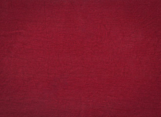 Old crumpled dark burgundy cotton texture