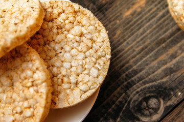 Salty rice crackers galettes with spices. Tasty salty healthy biscuits.