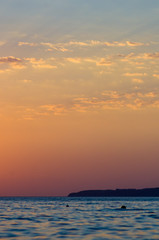 Amazing sea sunset, the sun, waves, clouds