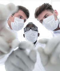 close up.a group of promising scientists are conducting research