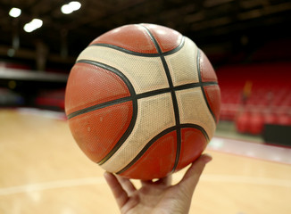 Man holding basketball