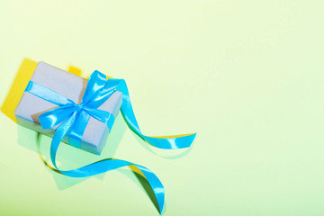  gifts on a yellow background blue ribbon ukrainian flag colors surprise gifts to give with their own hands