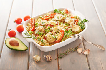 Vegetarian Vegetable pasta Fusilli with zucchini, tomatoes and avocados. Raw vegan pasta. Spaghetti. Italian food. Italy. Roma. Fine dining. Healthy food. Fresca Pasta. Vegetarian. Healthy food