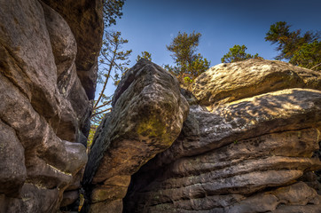 Big rocks in stone labyrinth Bledne skaly in Szczeliniec Wielki in National Park Stolowe Mountains,...