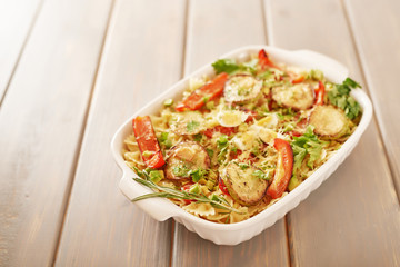 Vegetarian Vegetable pasta Fusilli with zucchini, tomatoes and avocados. Raw vegan pasta. Spaghetti. Italian food. Italy. Roma. Fine dining. Healthy food. Fresca Pasta. Vegetarian. Healthy food