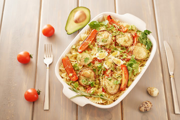 Vegetarian Vegetable pasta Fusilli with zucchini, tomatoes and avocados. Raw vegan pasta. Spaghetti. Italian food. Italy. Roma. Fine dining. Healthy food. Fresca Pasta. Vegetarian. Healthy food