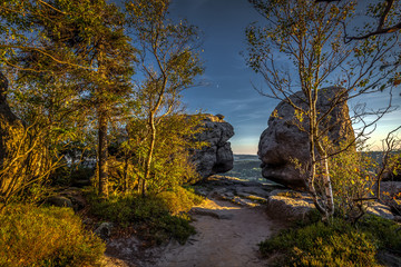 Scenic evening view on the top of Szczeliniec Wielki in National Park Stolowe Mountains, Sudety, Poland 