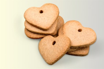 Cup of tea with cookies over  background
