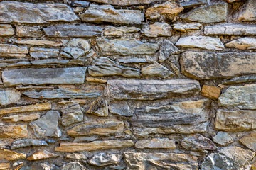 Old stone fence texture background in the Bulgarian village of Krepost, Haskovo Province