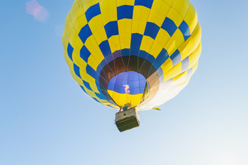 Colorful hot air balloon against the blue sky