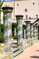 Fototapeta na wymiar Cloister Garden of the Santa Chiara Monastery in Naples, Italy