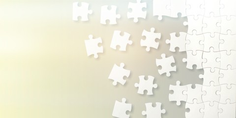 White puzzle pieces on grey background