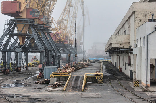 Port warehouse with ramp and cranes and other infrastructure of the port. Cargo port Odessa, Ukraine