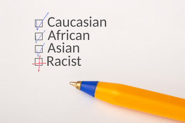 ethnicity - checkbox with a tick on white paper with yellow pen. Checklist concept.