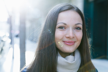 Portrait of cheerful young woman in the  jacket