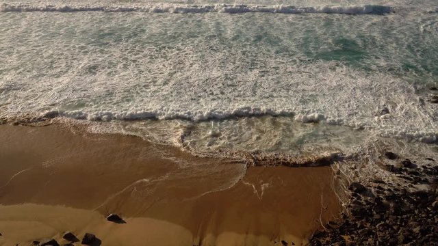 steep coast at the Atlantic Ocean. Near El Cotillo, Island Fuerteventura, Spain
