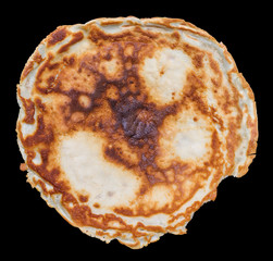 Round burned pancake