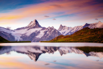 Great view of the snow rocky massif. Location Bachalpsee in Swiss alps, Grindelwald valley.