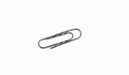 Top view. Steel paper clip isolated on white background