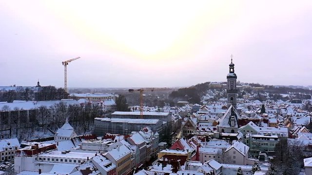 Aerial view of the bavarian city Freising in winter, snowing
