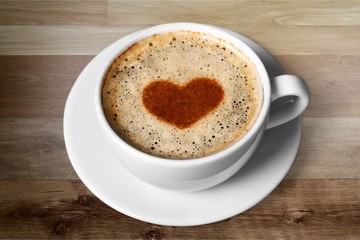 Latte coffee with heart symbol isolated on white background