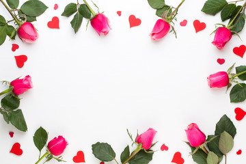 Flowers composition. Frame made of red rose on white background. Flat lay, top view, copy space.