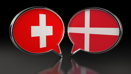 Fototapeta premium Switzerland and Denmark flags with Speech Bubbles. 3D illustration