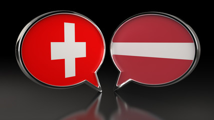 Fototapeta premium Switzerland and Latvia flags with Speech Bubbles. 3D illustration