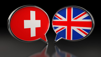 Obraz premium Switzerland and United Kingdom flags with Speech Bubbles. 3D illustration
