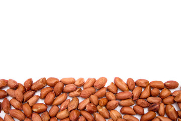 Red peanuts, fried peanuts. Peanuts on white background. Uncleaned peanuts.