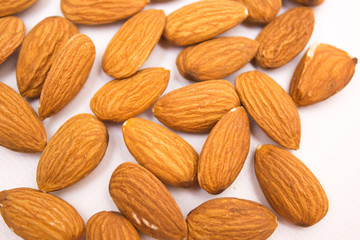 Fototapeta premium Almond. Almonds on white background. Almond nuts.
