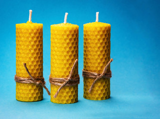 three candles of yellow beeswax