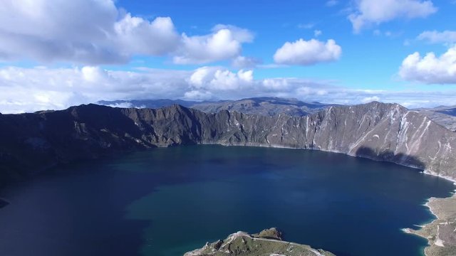 Quilotoa Lake and Clouds in the Andes. 