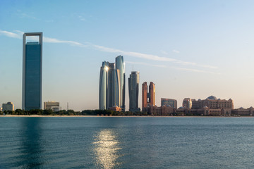 Fototapeta na wymiar Beautiful view of Abu Dhabi city beach, famous Etihad towers and buildings