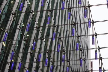 Obraz premium Modern Office Building With Blue Bulb Canopy