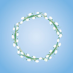 Fototapeta premium wreath of snowdrops and mimosa on blue background