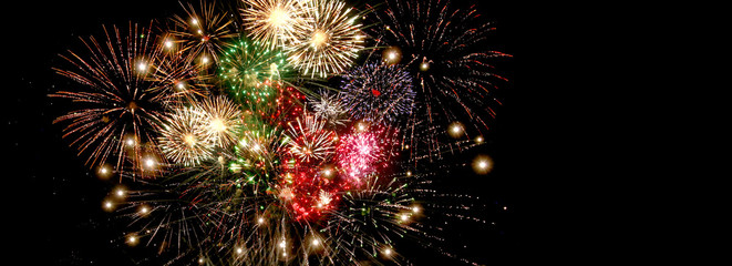 Beautiful colorful fireworks  for celebration on dark background , New year holiday concept - obrazy, fototapety, plakaty