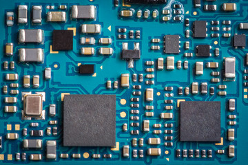 Close up zoom shot of mobile phone mother board with microchips and circuits.