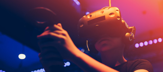 Girl using virtual reality goggles