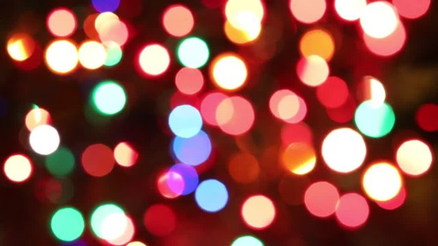 background of flashing lights intentionally blurred to make an abstract backdrop almost dreamlike