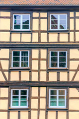 Facades of colorful houses in Alsace in northern France on a sunny day