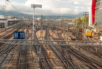 Fototapeta premium Train tracks in the Swiss city of Geneva on a cloudy day
