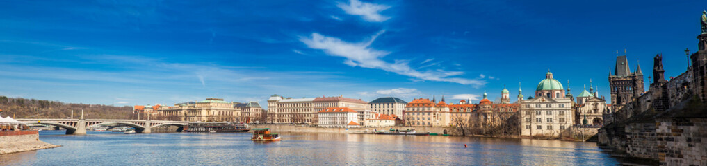 PRAGUE, CZECH REPUBLIC - APRIL, 2018: The beautiful old town of Prague city, the Vltava river and the iconic Charles bridge
