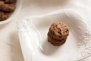 gingerbread in a white plate. chocolate chip cookies. dessert. candy