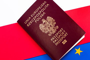 Polish passport document on the background of Polish and European flag