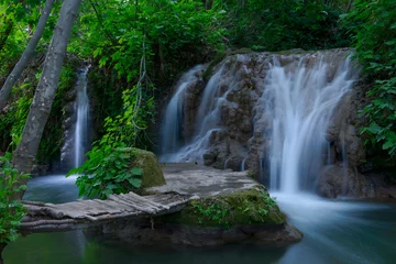 Tuinposter waterfall in deep forest © AMAR