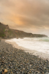 Shoreline on Rocky Beach at Dawn