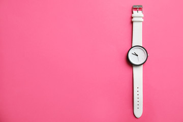 Stylish wrist watch on color background, top view with space for text. Fashion accessory - Powered by Adobe
