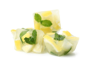 Ice cubes with mint and lemon on white background