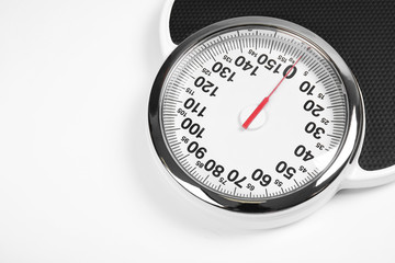 Modern scales isolated on white. Diet and weight loss